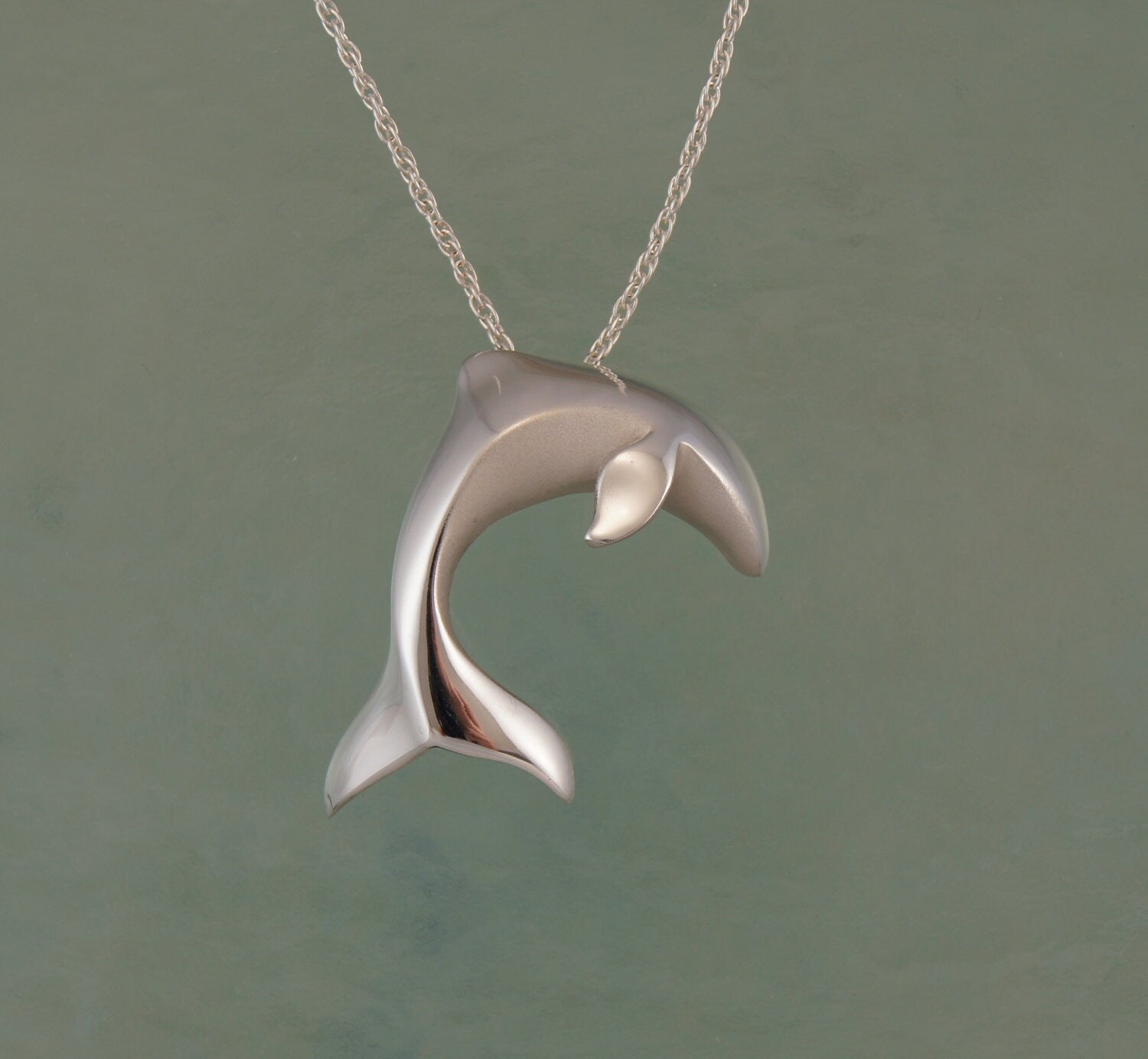 large dolphin leaping siver pendant