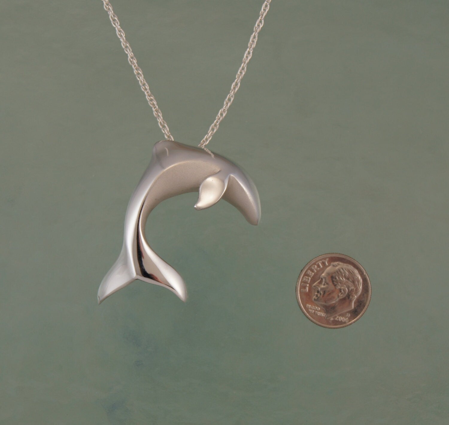 large dolphin leaping siver pendant