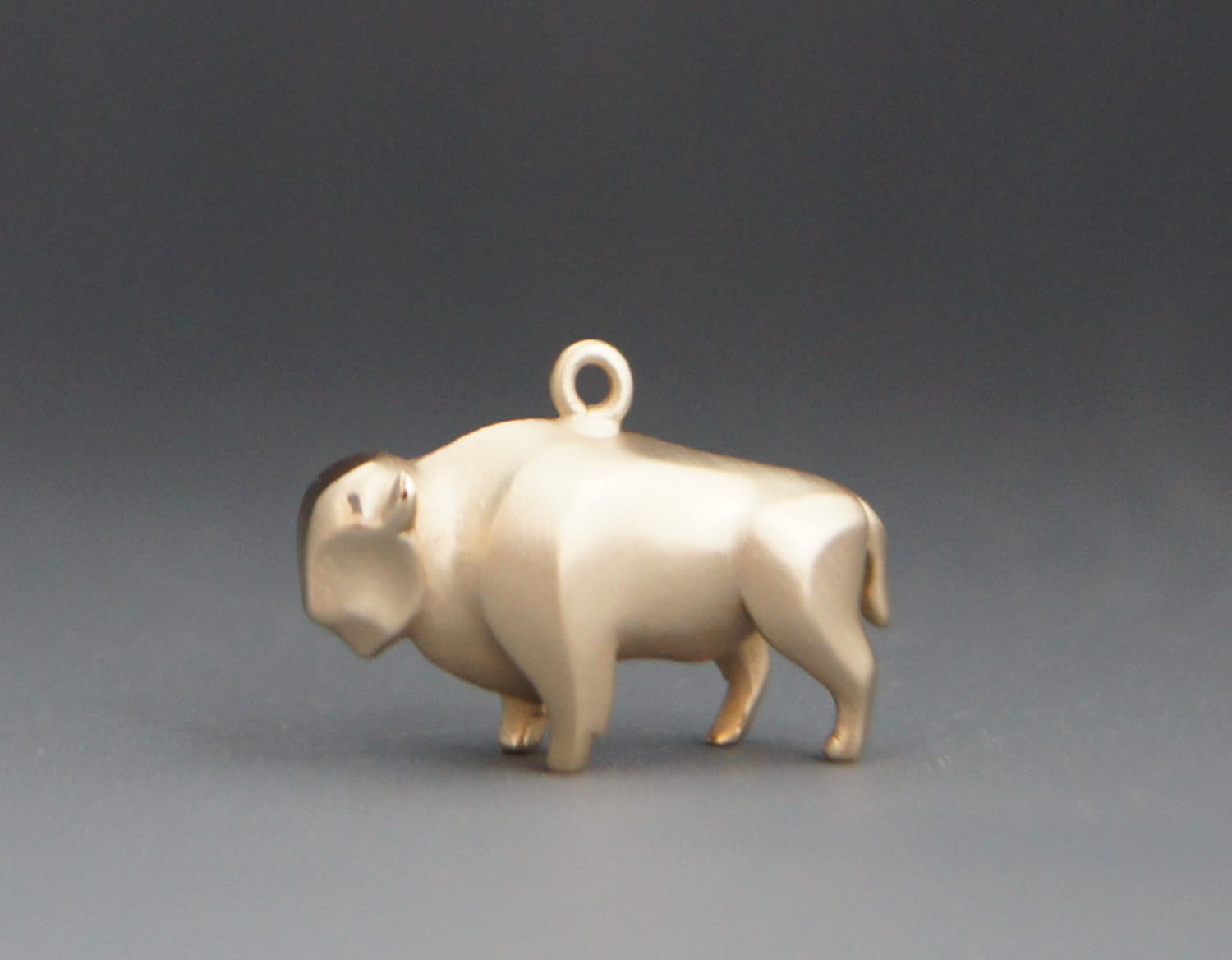 bronze  buffalo   charm or pendant