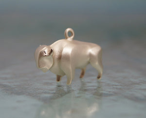 bronze  buffalo   charm or pendant