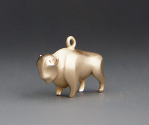 bronze  buffalo   charm or pendant