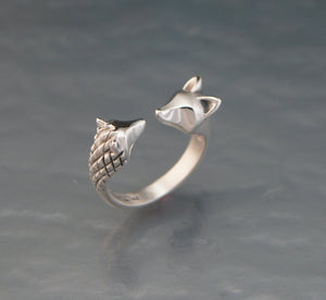 curious hedge hog / fox in  silver