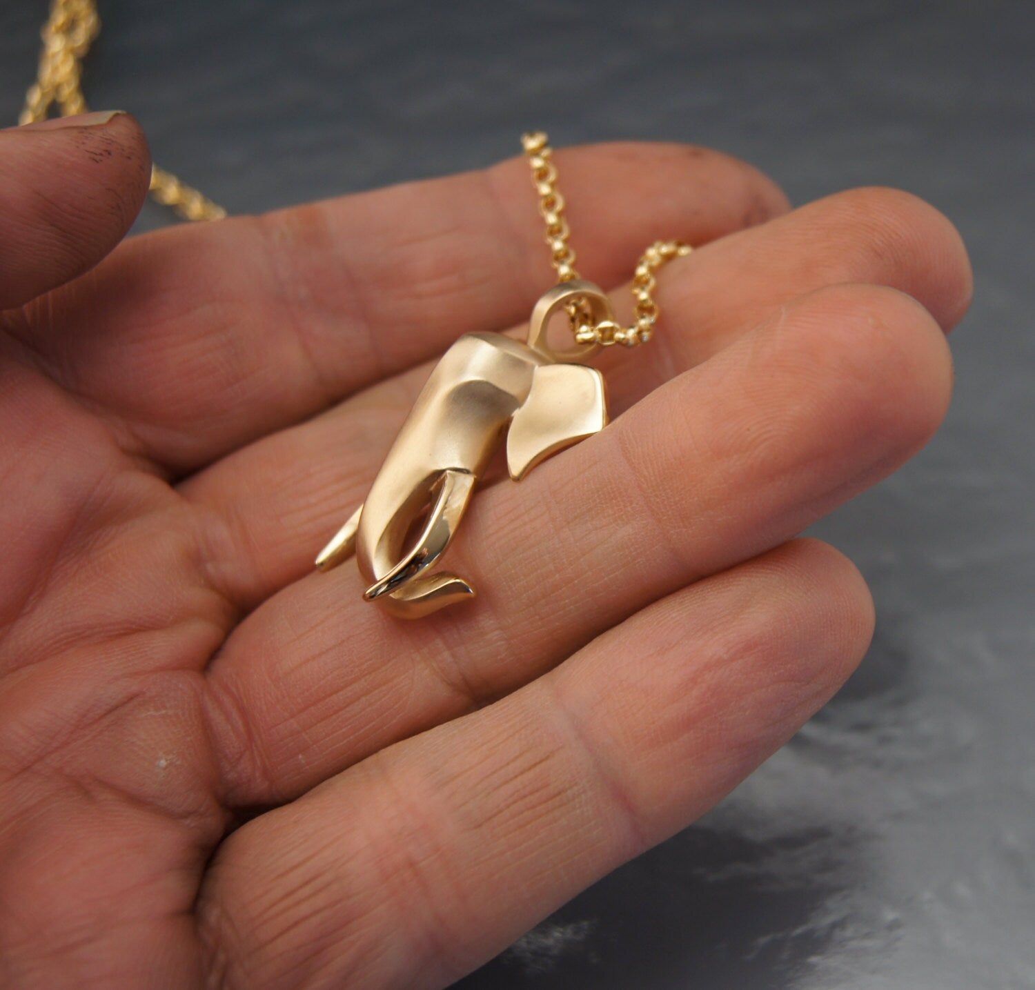 bull elephant,  bronze. 14 k gold fill chain