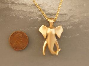 bull elephant,  bronze. 14 k gold fill chain